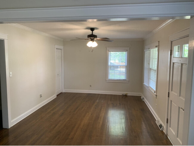 Living room, hardwood floors, small coat closet in corner - 1112 Joyner Ave