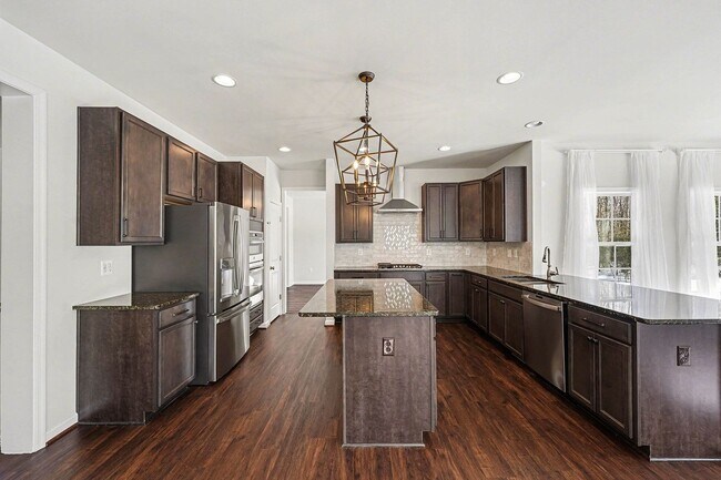 Building Photo - Luxurious Living Lewis Style: A Spacious 5-Bedroom Home with Modern Elegance