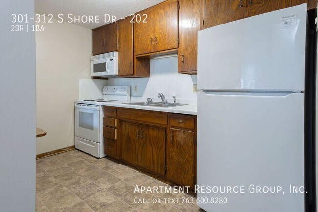 Building Photo - 301-312 S Shore Dr-202