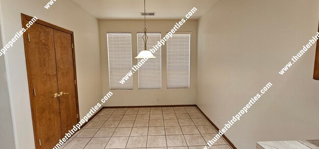 Building Photo - Beautiful and Spacious in NE Heights Gated...