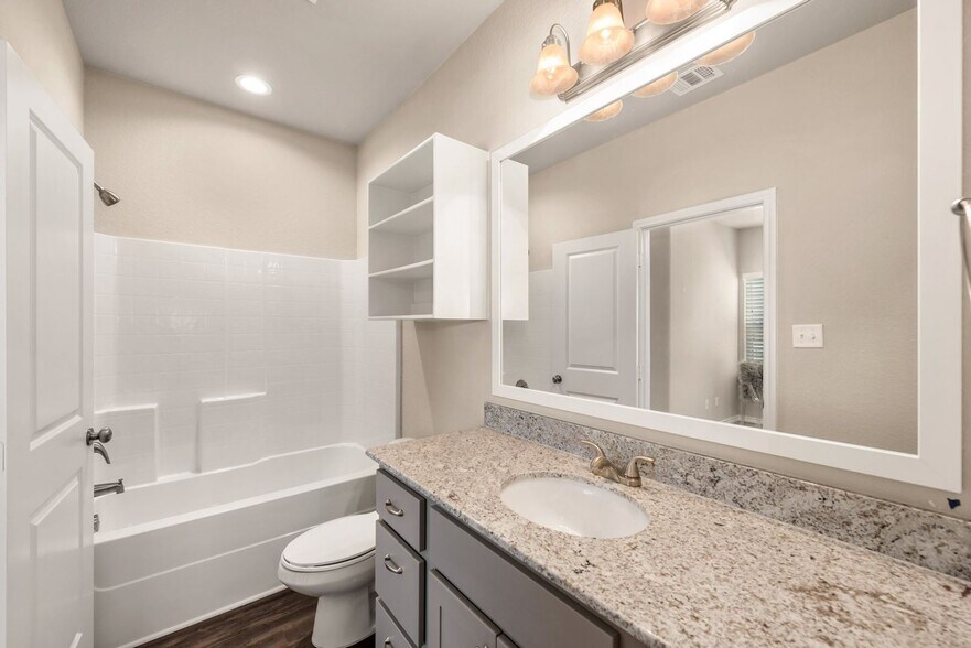 Building Photo - Now Pre-Leasing for June 2026! Well Appointed Townhomes with Fenced Backyards Close to Bus Stop &...