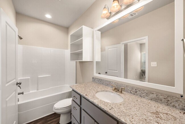 Building Photo - Now Pre-Leasing for June 2026! Well Appointed Townhomes with Fenced Backyards Close to Bus Stop &...
