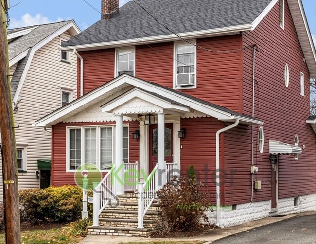 Building Photo - Spacious 3-Bed, 2-Bath Nutley Home with Bonus Office, Multi-Level Deck & Quiet Location