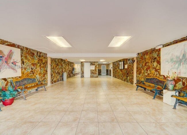 Building Photo - 6950 W 6th Ave