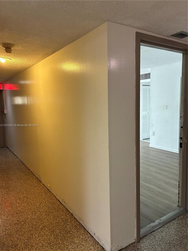 Building Photo - 4675 W 18th Ct