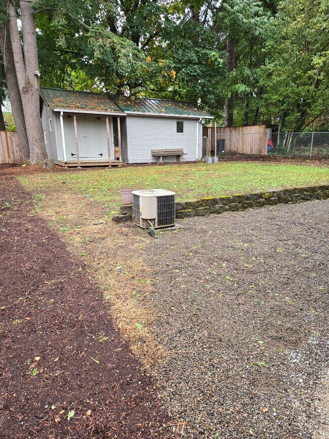 Building Photo - Large lot with tons of storage !  3 br , 2 bth + office+ 2  Car-garage + 2 Wooden Sheds