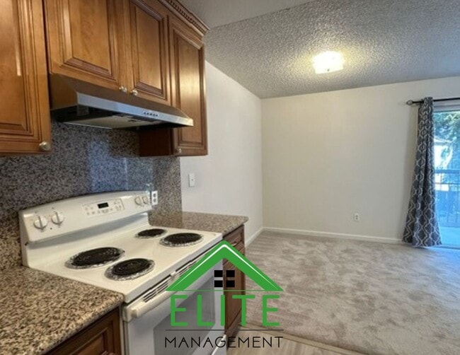 Building Photo - **2 Bed, 2 Bath Condo in Gated Community |...