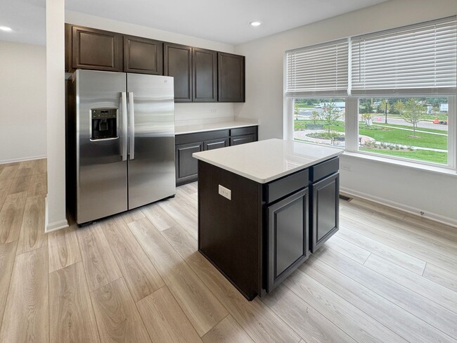Building Photo - Step into modern living with this brand-ne...