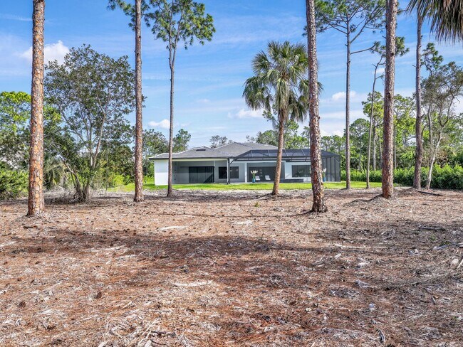 Building Photo - Brand-new contemporary estate on 2.27 private acres