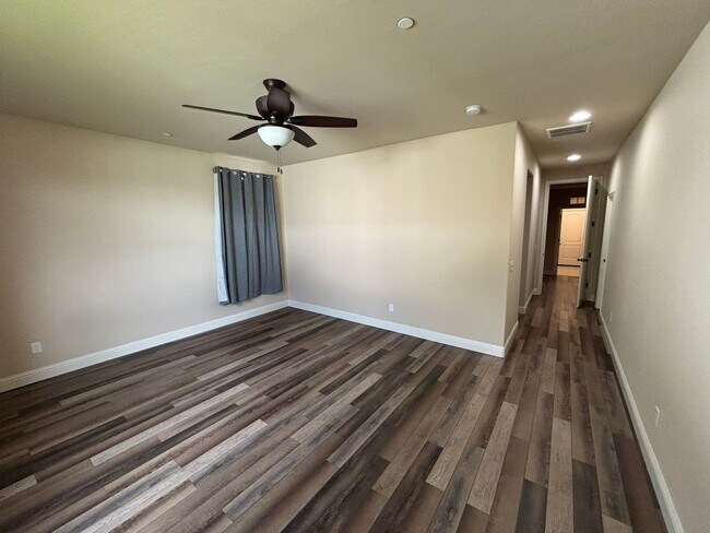 Building Photo - 4-Bedroom Home with 3-Car Garage, Office, Gated Community Pool & HOA Included