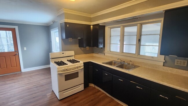 Building Photo - Cozy 3 bedroom Cape Cod with attached garage! First floor offers living room, formal dining, and ...