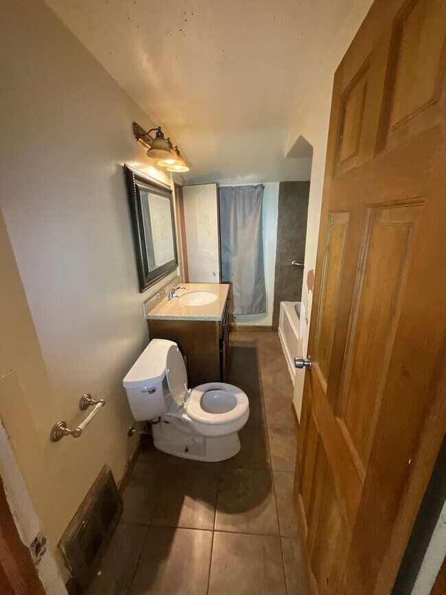 Building Photo - Charming Three-Bedroom Single-Family Home with Ongoing Updates