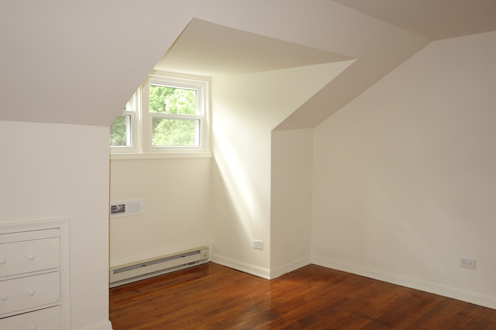 Second floor bedroom with hardwood floors and built in. - 116 Howard Dr