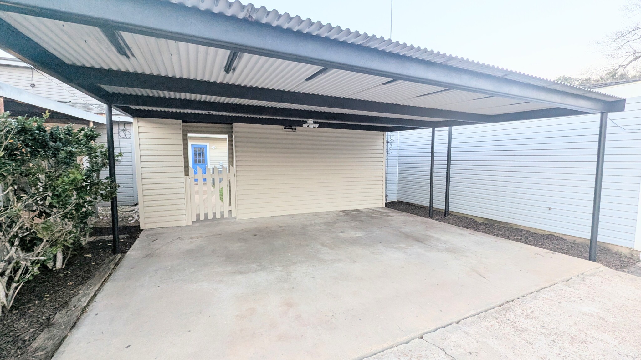 Dedicated 2-car carport makes parking a breeze. - 813 Clubside Dr