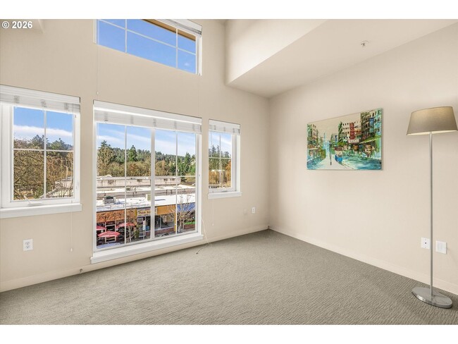 Building Photo - Main Street Living with Granite Kitchen, Gas Fireplace, and MAX Line Access