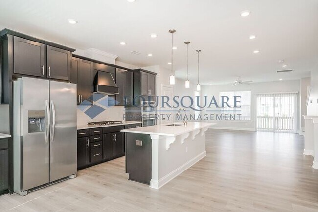 Building Photo - Spacious  End-Unit Townhome | Rear Deck & 2-Car Garage  | Near Brier Creek