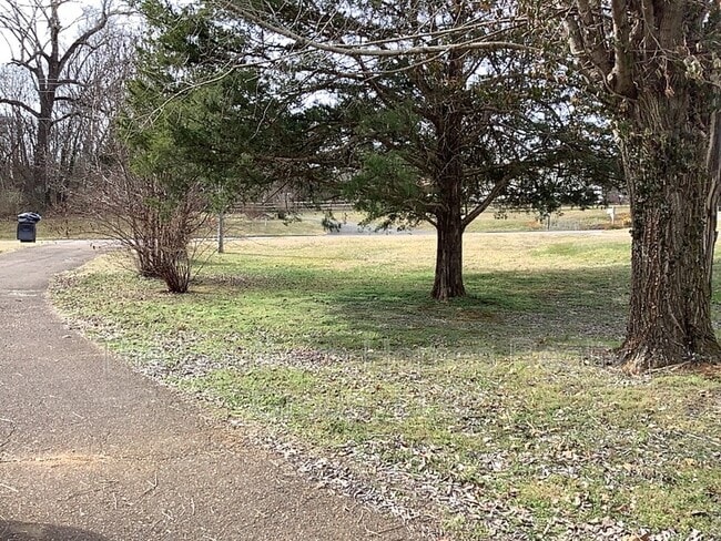 Building Photo - 1221 S Matlock Ave