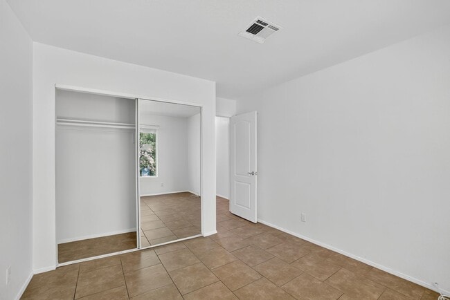 Building Photo - READY TO MOVE-IN UPPER LEVEL 2-BEDROOM CONDO!