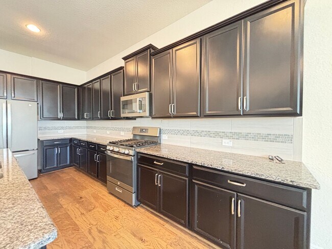 Building Photo - Beautiful 4-Bedroom Home with Free Communi...