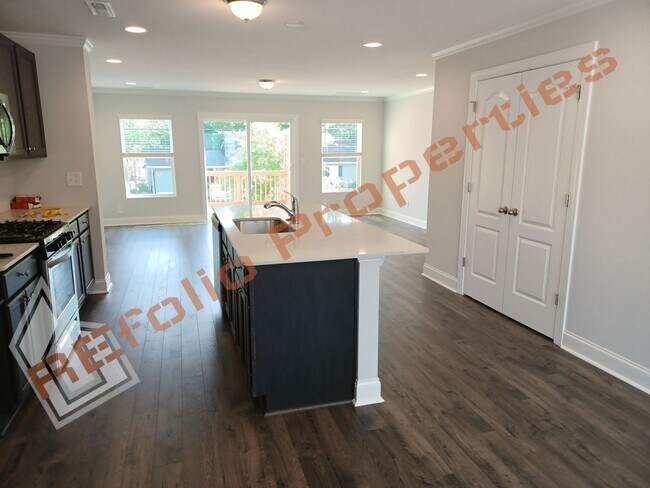 Building Photo - Built in 2022! 3 Story 3 Bedroom 1-Car Gar...