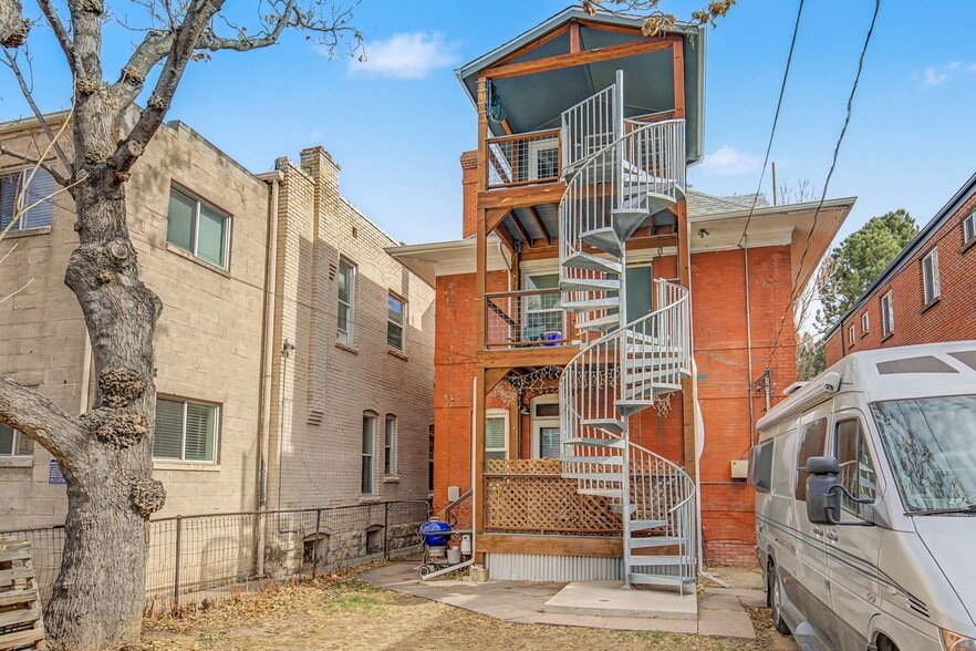 entrance at top of spiral stairs - 1427 Clayton St