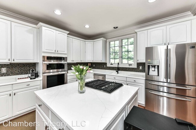 Building Photo - 4 br, 4.5 bath House - 6660 Avignon Blvd.