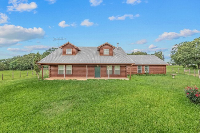 Building Photo - 10 acres with 3/2 cabin for rent in Navaso...