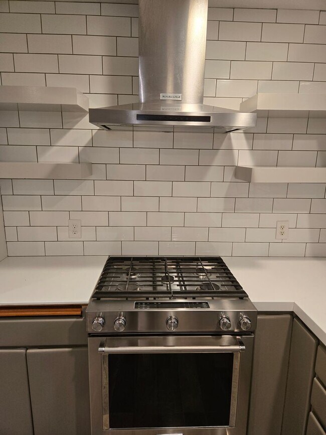 Building Photo - Large lot with tons of storage !  3 br , 2 bth + office+ 2  Car-garage + 2 Wooden Sheds