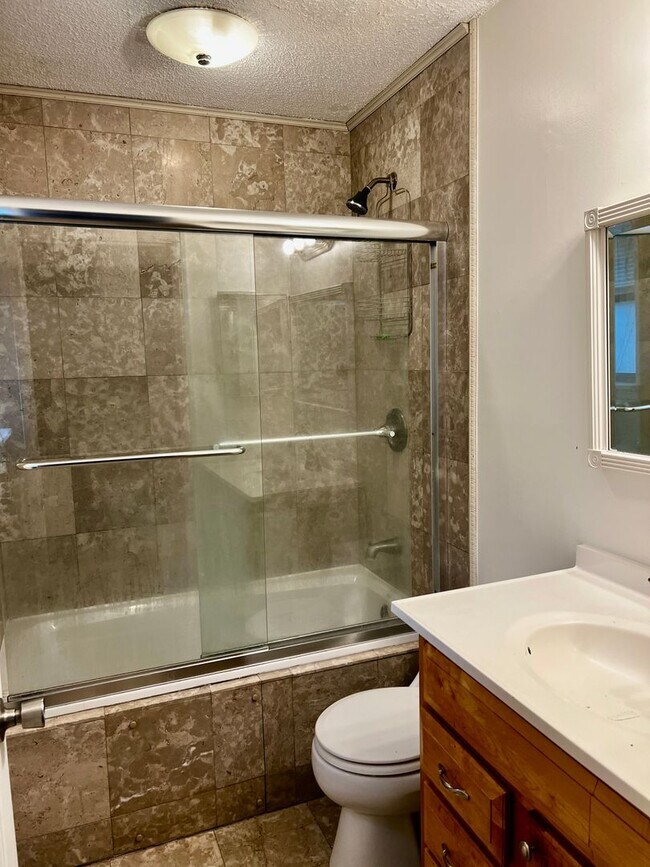 Building Photo - Charming 3-Bedroom, 2-Bathroom Home with Sunroom & Flex Room