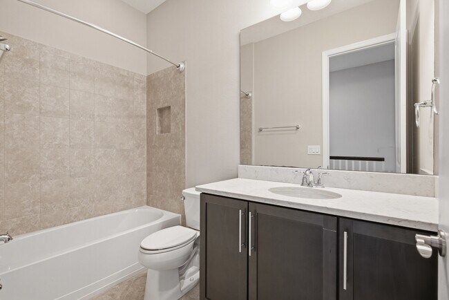 Building Photo - Move In Ready End Unit Townhome in Laureate Park | 3 Bed | Tesla Charger