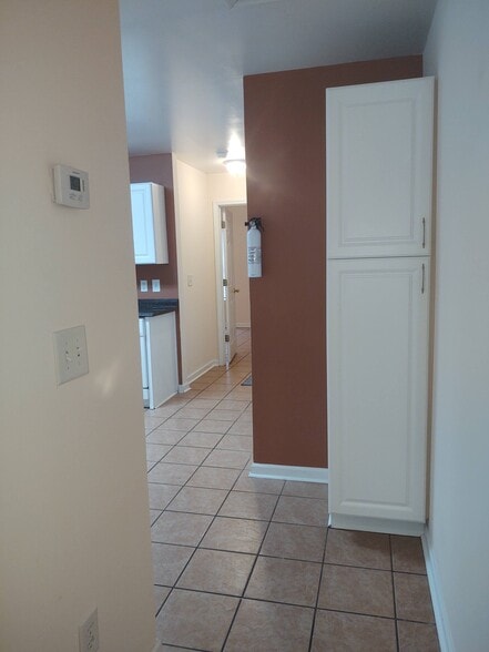 Walk to kitchen/ding and back of apartment - 247 Hereford Cir