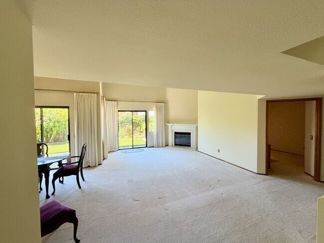 Building Photo - Private Oasis with Sunroom, Balcony & Lush Landscaping | 4BR Home Near Community Pool & Spa