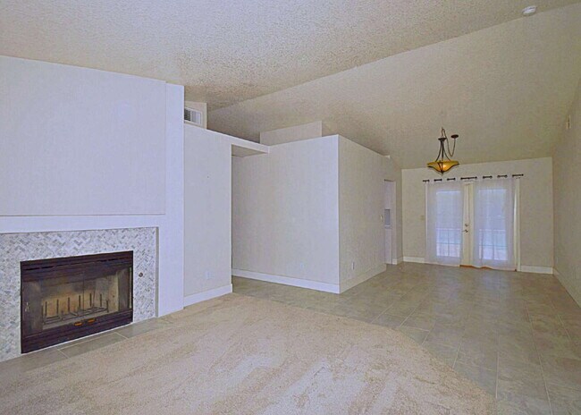 Building Photo - "Charming Oasis: 3-Bedroom Cathedral City Retreat with Pool, Fireplace, and Granite Kitchen!"