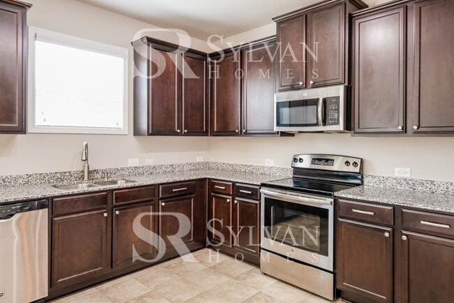 Building Photo - Embrace the charm of this 4 BR, 2.5 BA home