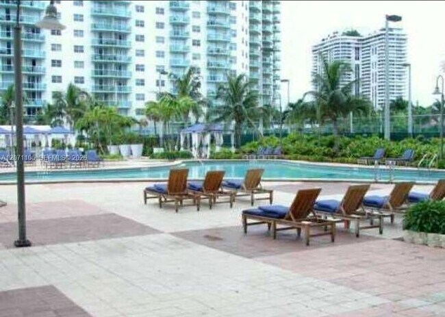 Building Photo - 19380 Collins Ave