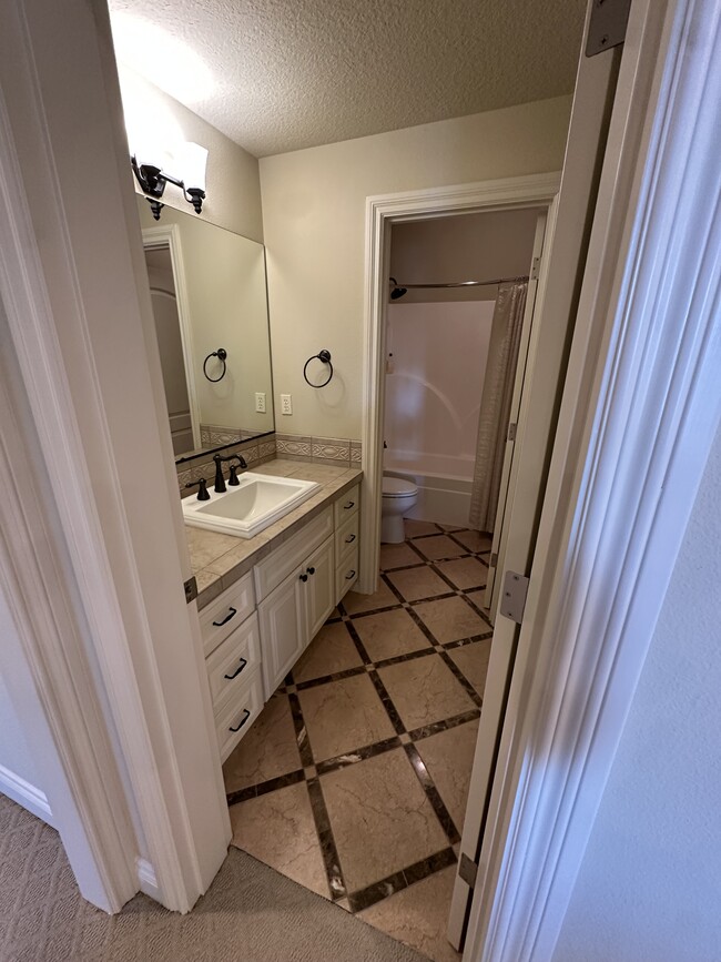 Bathroom with tile floors - 1404 SW Dickinson Ln