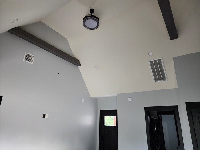 Living room ceiling with ceiling fan - 16271 E 82nd St N