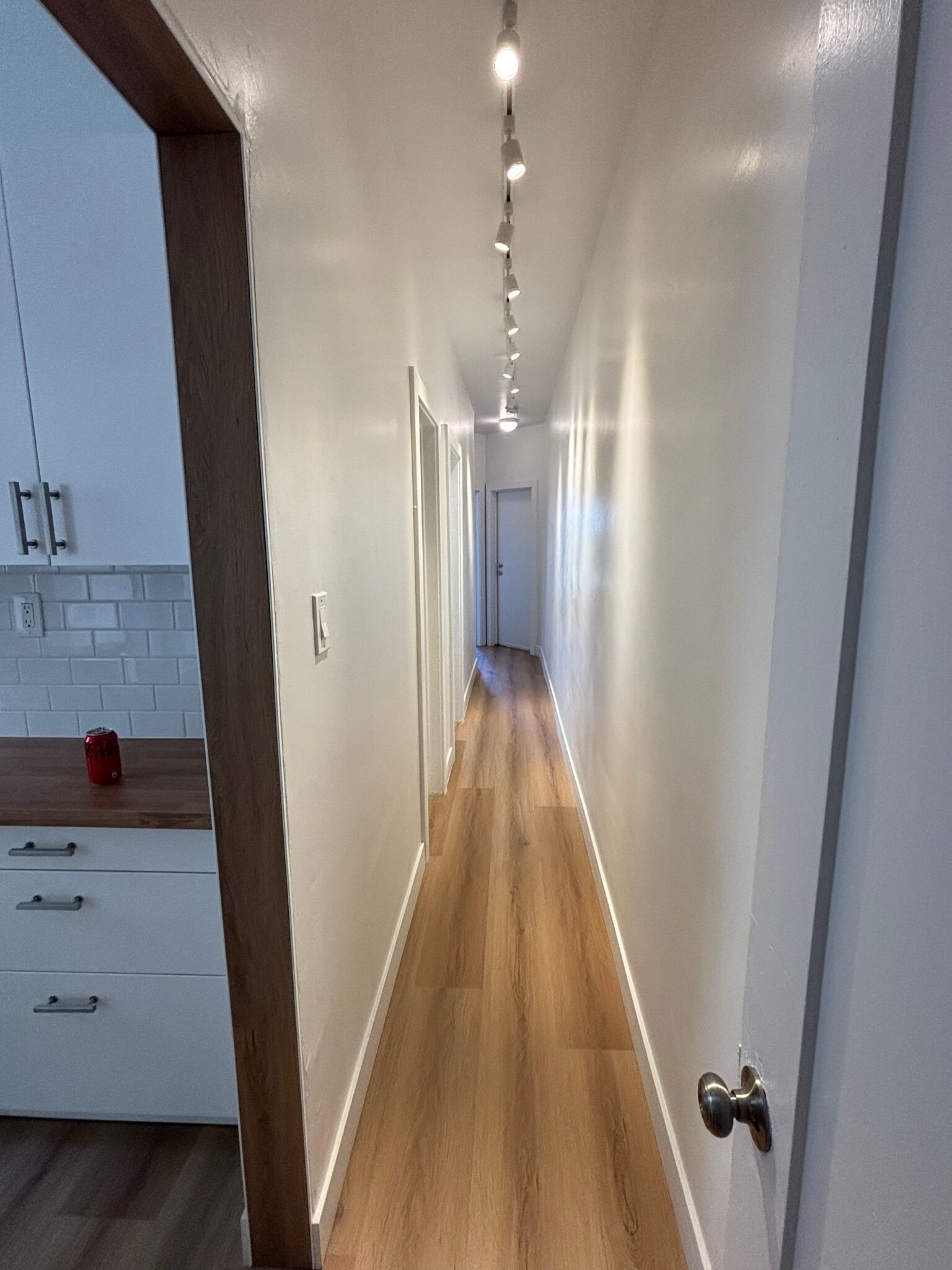 Long hallway leading to bathroom and rooms - 2109 1/2 W 54th St