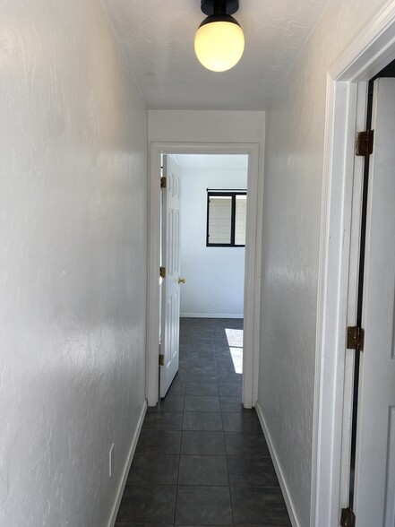 hallway to bedroom 3, bathroom 2 - 944 E 5th Ave