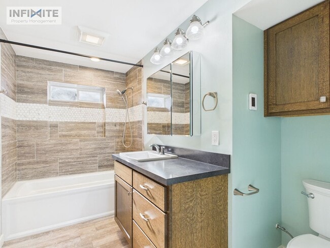 Building Photo - Great Four Bedroom! First Month Half Off!!