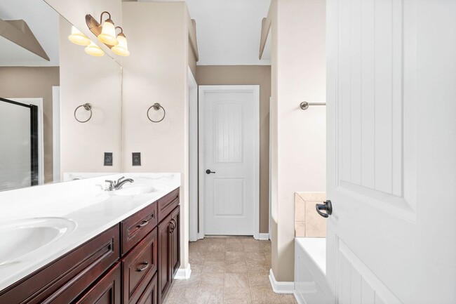 Building Photo - Pet Friendly Three Bedroom with Bonus!