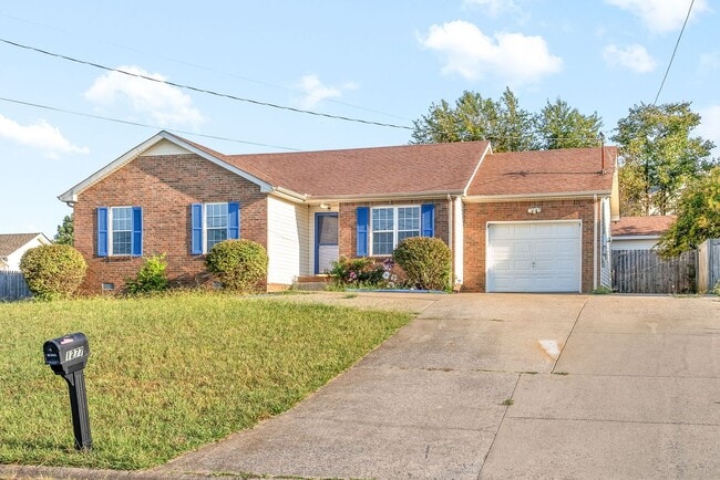 Building Photo - Adorable home with fenced back yard coming...