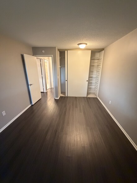 View from window of 2nd bedroom into hall. - 8935 Old Cedar Ave S