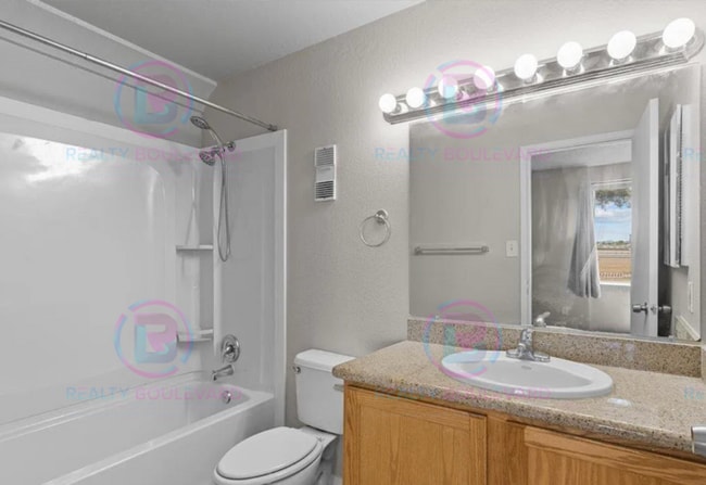 Building Photo - Incredible condo near UNR! This charming 2...
