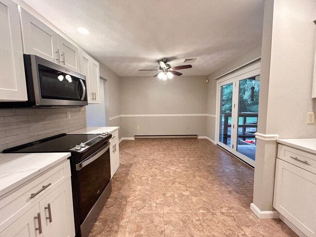 Building Photo - Spacious 4-Bedroom Home with Large Yard & Garage!