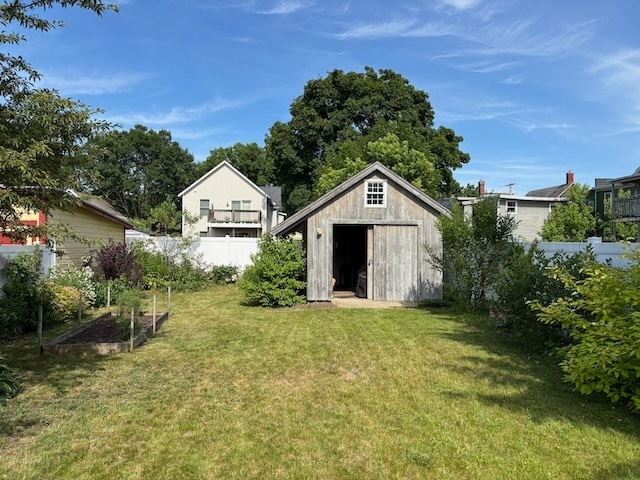 A shot of the backyard and storage shed from the dining room exit. - 52 Rose St