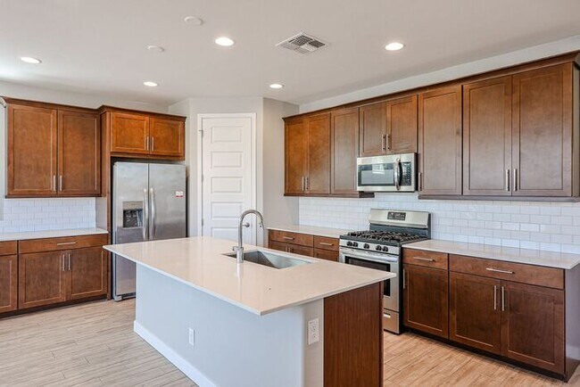 Building Photo - Available August 7th! Gated Community 4 Bedroom 3 Bathroom Home!