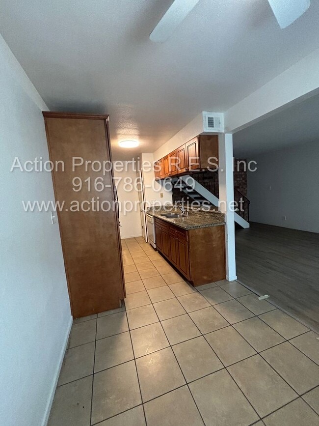 Building Photo - Action Properties RES Inc: offering Roseville Greens Condo 2 Story 2 Bedroom, Carport Parking Sha...