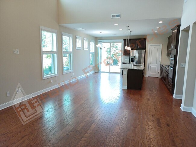 Building Photo - Luxury 5 Bedroom, 3 Bath, 2-Car Garage End Unit Townhouse w/1st level Primary Suite + Guest Suite...