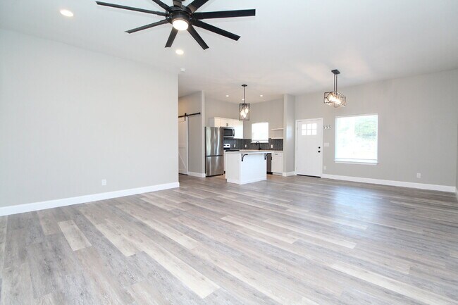 Building Photo - Fully Remodeled 2BR/2BA Attached Home with Garage, Modern Finishes, Park Views & Prime Downtown P...